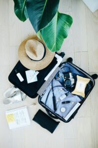 a packing list and luggage with contents a packing list and luggage with contents